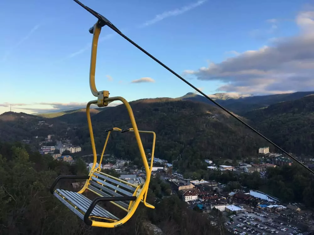 yellow chair going up the mountain at the gatlinburg skylift 